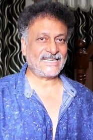 Indu's father