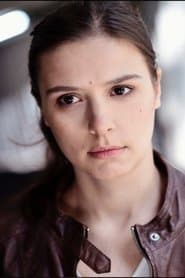 M.