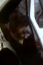 Man in back seat